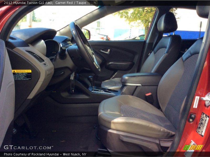 Garnet Red / Taupe 2012 Hyundai Tucson GLS AWD