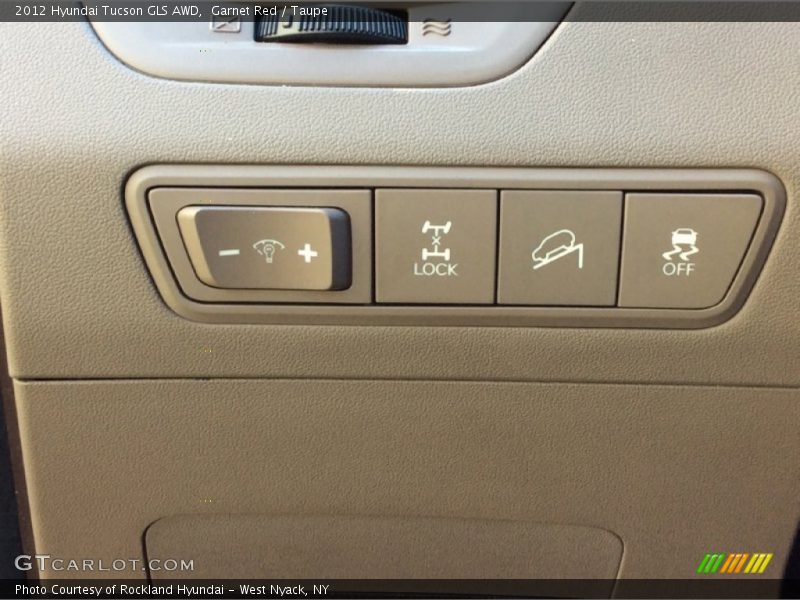 Garnet Red / Taupe 2012 Hyundai Tucson GLS AWD