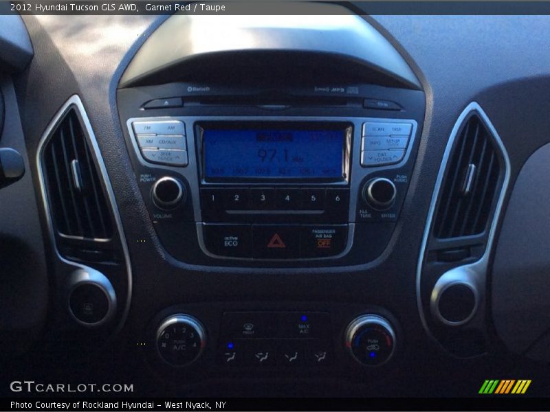 Garnet Red / Taupe 2012 Hyundai Tucson GLS AWD