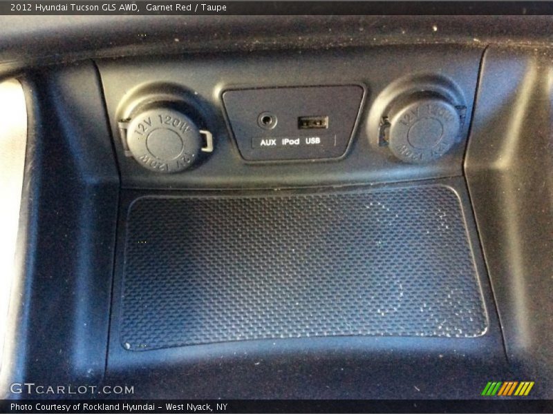 Garnet Red / Taupe 2012 Hyundai Tucson GLS AWD