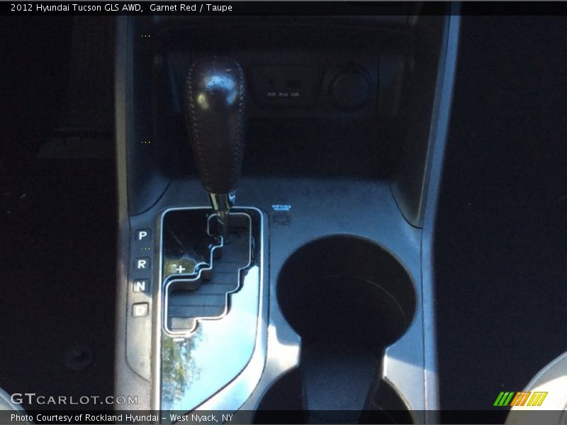 Garnet Red / Taupe 2012 Hyundai Tucson GLS AWD