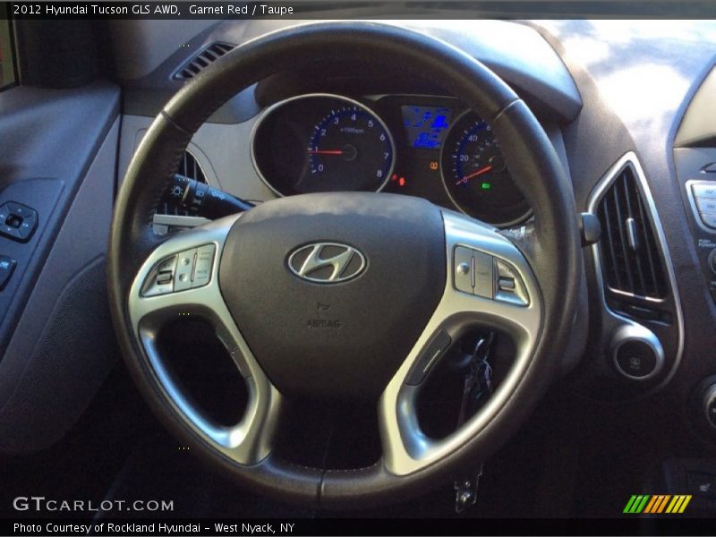 Garnet Red / Taupe 2012 Hyundai Tucson GLS AWD