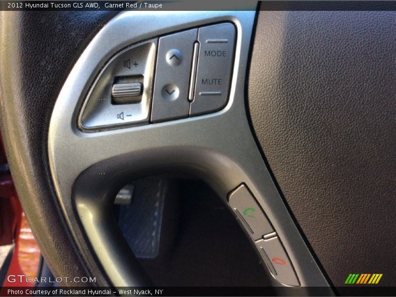 Garnet Red / Taupe 2012 Hyundai Tucson GLS AWD