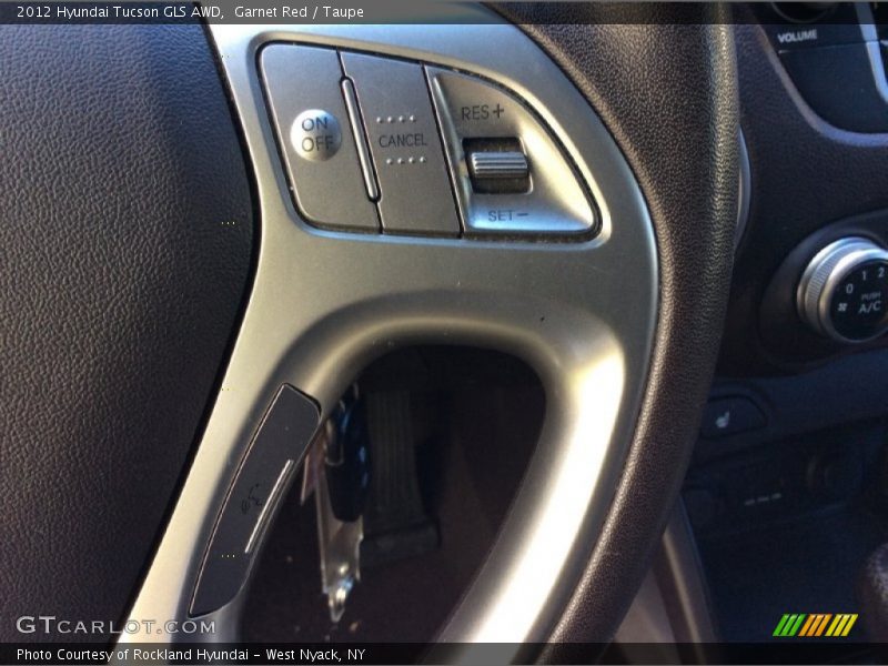 Garnet Red / Taupe 2012 Hyundai Tucson GLS AWD