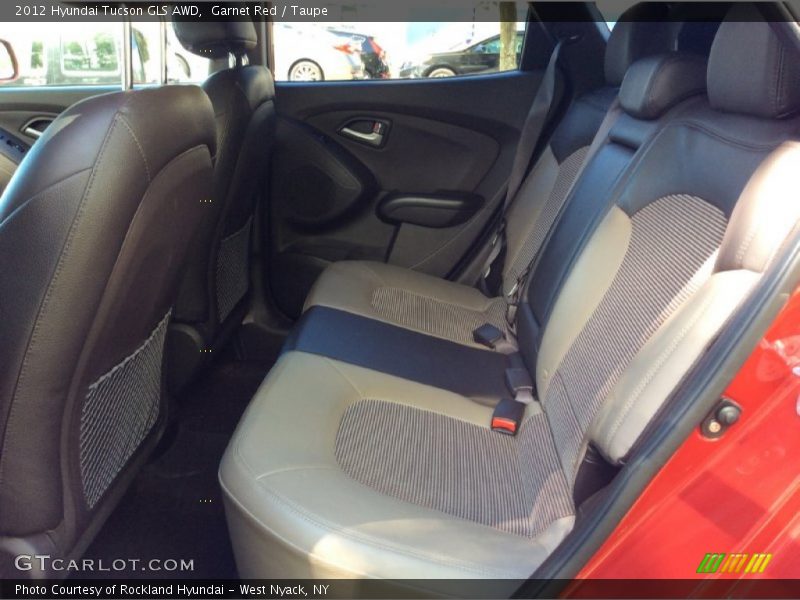 Garnet Red / Taupe 2012 Hyundai Tucson GLS AWD