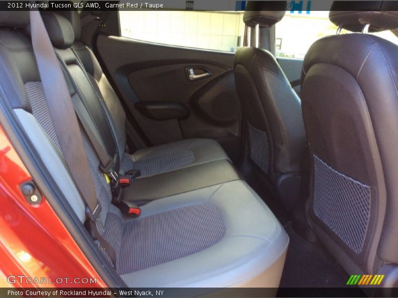 Garnet Red / Taupe 2012 Hyundai Tucson GLS AWD