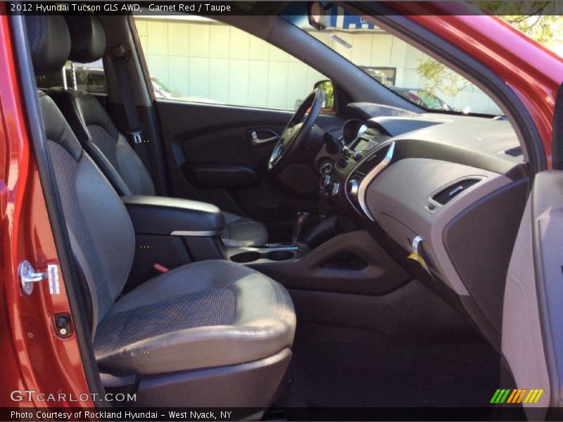 Garnet Red / Taupe 2012 Hyundai Tucson GLS AWD