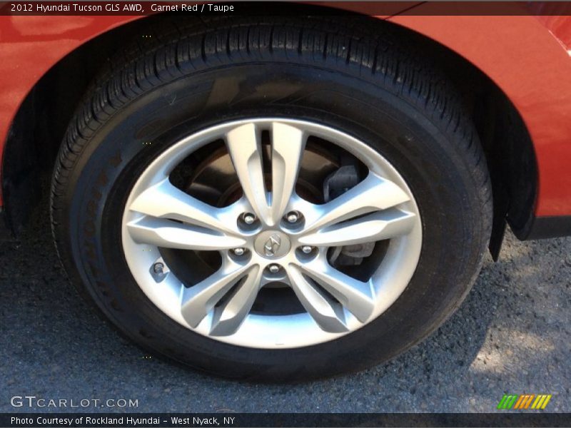 Garnet Red / Taupe 2012 Hyundai Tucson GLS AWD