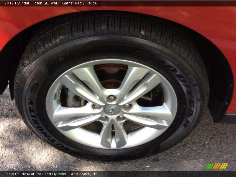Garnet Red / Taupe 2012 Hyundai Tucson GLS AWD