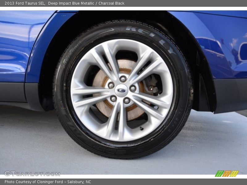 Deep Impact Blue Metallic / Charcoal Black 2013 Ford Taurus SEL