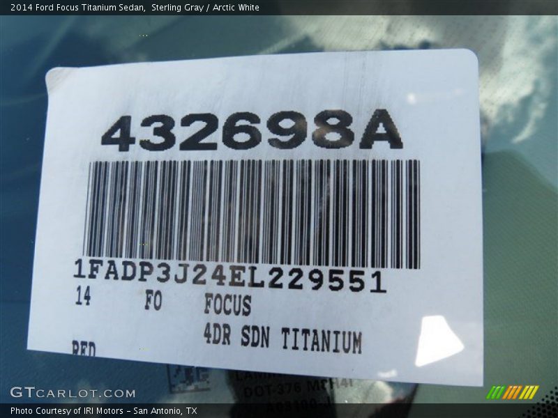 Sterling Gray / Arctic White 2014 Ford Focus Titanium Sedan
