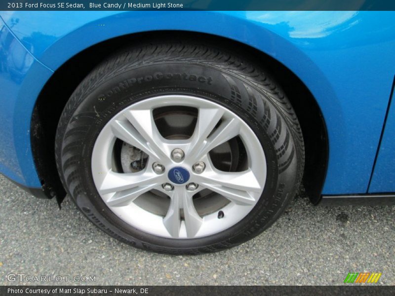 Blue Candy / Medium Light Stone 2013 Ford Focus SE Sedan