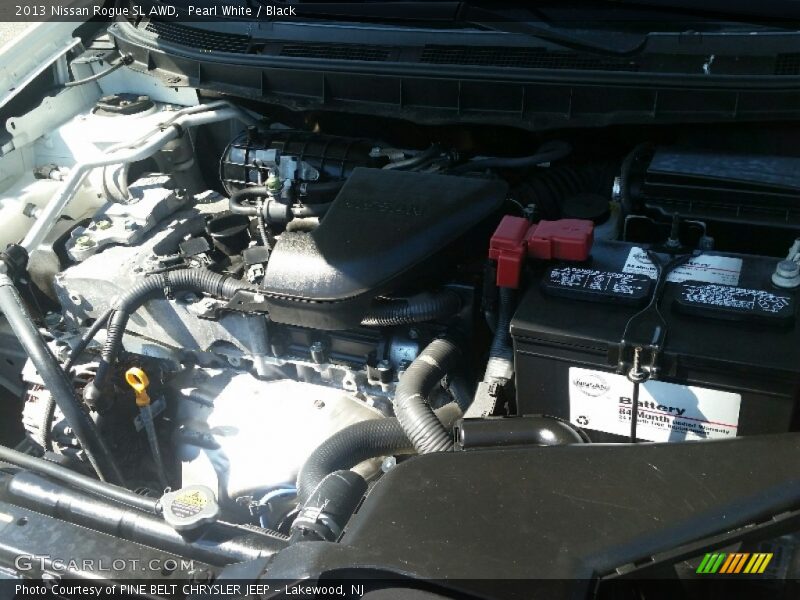 Pearl White / Black 2013 Nissan Rogue SL AWD