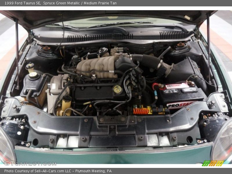 Spruce Green Metallic / Medium Prairie Tan 1999 Ford Taurus SE