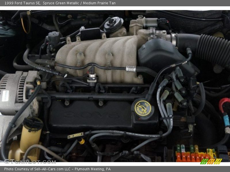 Spruce Green Metallic / Medium Prairie Tan 1999 Ford Taurus SE