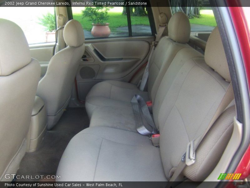 Inferno Red Tinted Pearlcoat / Sandstone 2002 Jeep Grand Cherokee Laredo