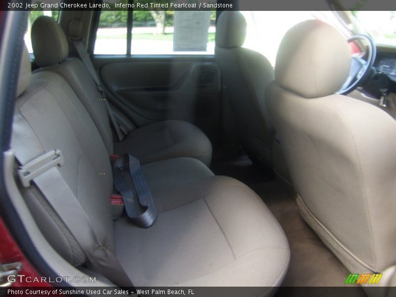 Inferno Red Tinted Pearlcoat / Sandstone 2002 Jeep Grand Cherokee Laredo