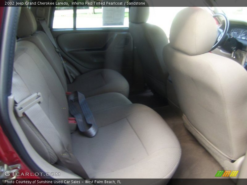 Inferno Red Tinted Pearlcoat / Sandstone 2002 Jeep Grand Cherokee Laredo