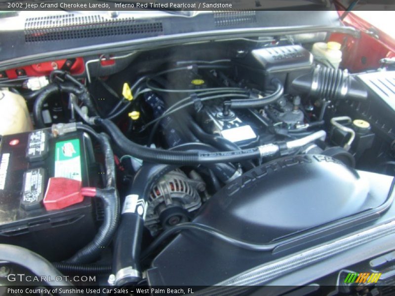 Inferno Red Tinted Pearlcoat / Sandstone 2002 Jeep Grand Cherokee Laredo