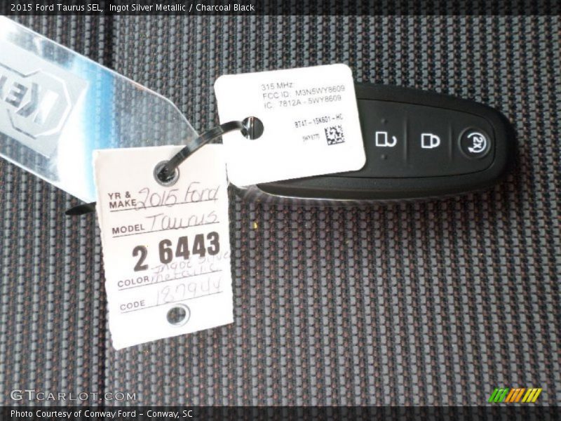 Ingot Silver Metallic / Charcoal Black 2015 Ford Taurus SEL