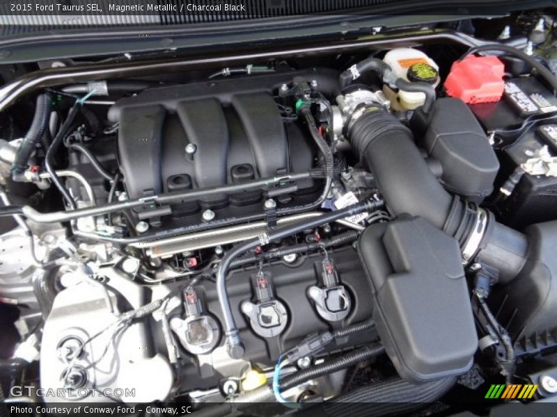 Magnetic Metallic / Charcoal Black 2015 Ford Taurus SEL