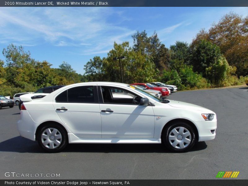 Wicked White Metallic / Black 2010 Mitsubishi Lancer DE