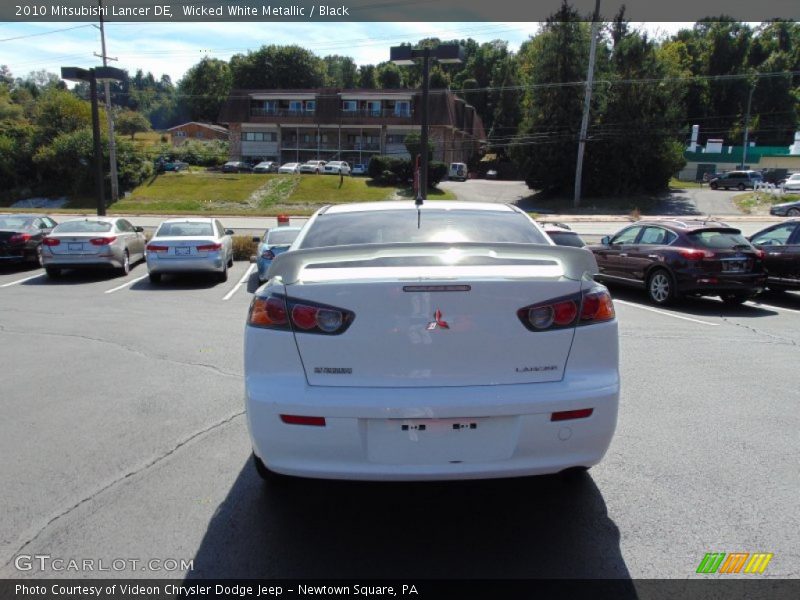 Wicked White Metallic / Black 2010 Mitsubishi Lancer DE