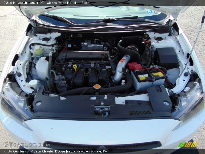 Wicked White Metallic / Black 2010 Mitsubishi Lancer DE