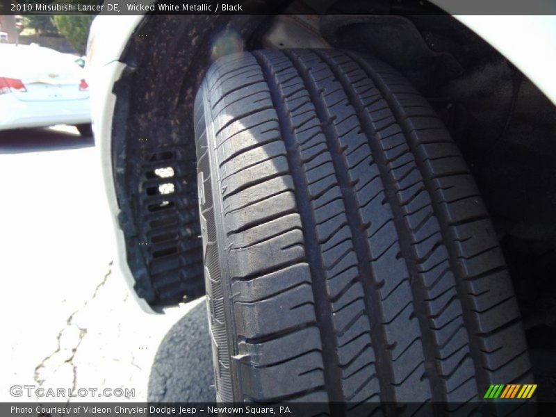 Wicked White Metallic / Black 2010 Mitsubishi Lancer DE