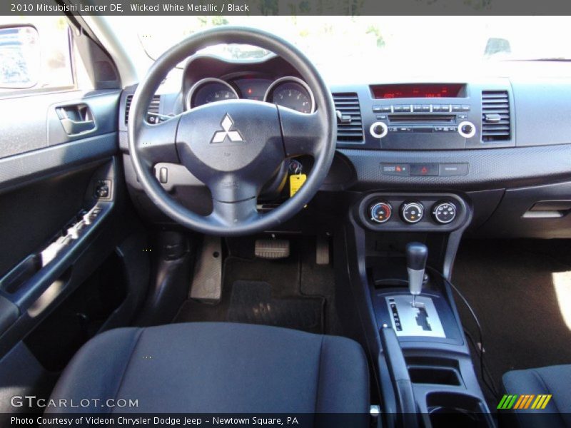 Wicked White Metallic / Black 2010 Mitsubishi Lancer DE