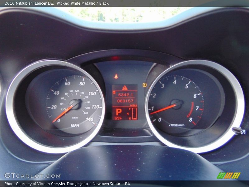 Wicked White Metallic / Black 2010 Mitsubishi Lancer DE