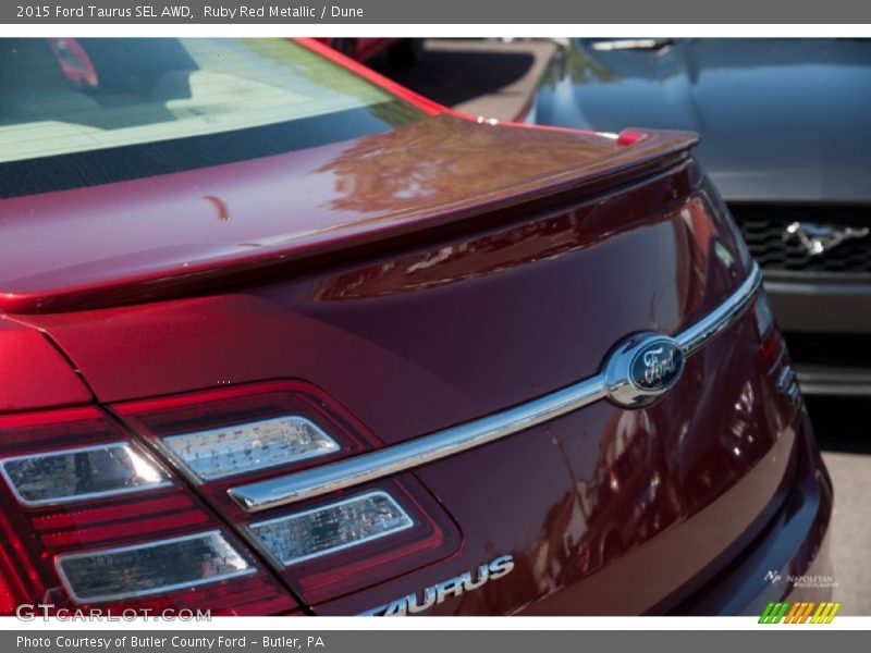 Ruby Red Metallic / Dune 2015 Ford Taurus SEL AWD