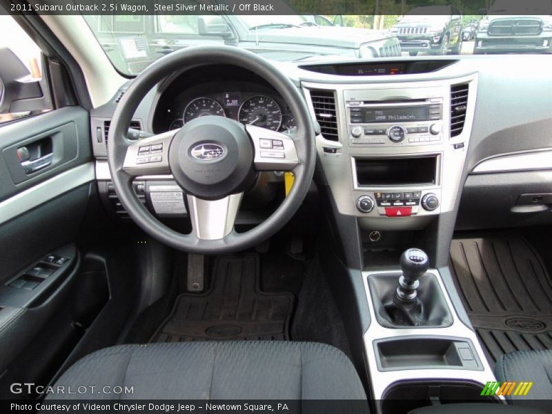 Dashboard of 2011 Outback 2.5i Wagon