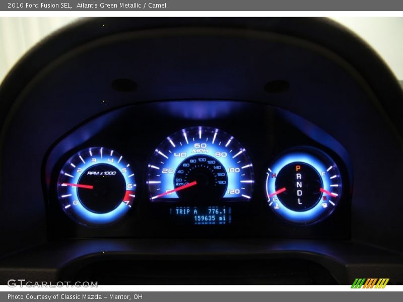 Atlantis Green Metallic / Camel 2010 Ford Fusion SEL