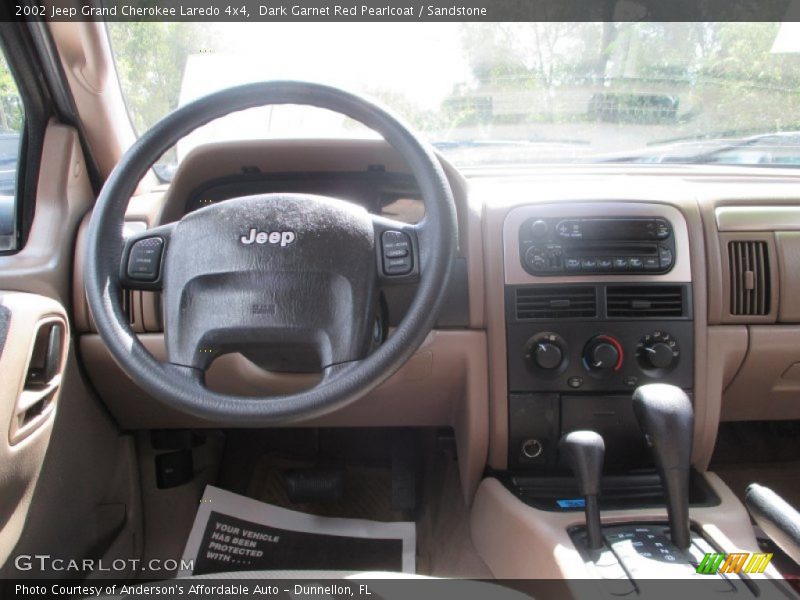 Dark Garnet Red Pearlcoat / Sandstone 2002 Jeep Grand Cherokee Laredo 4x4