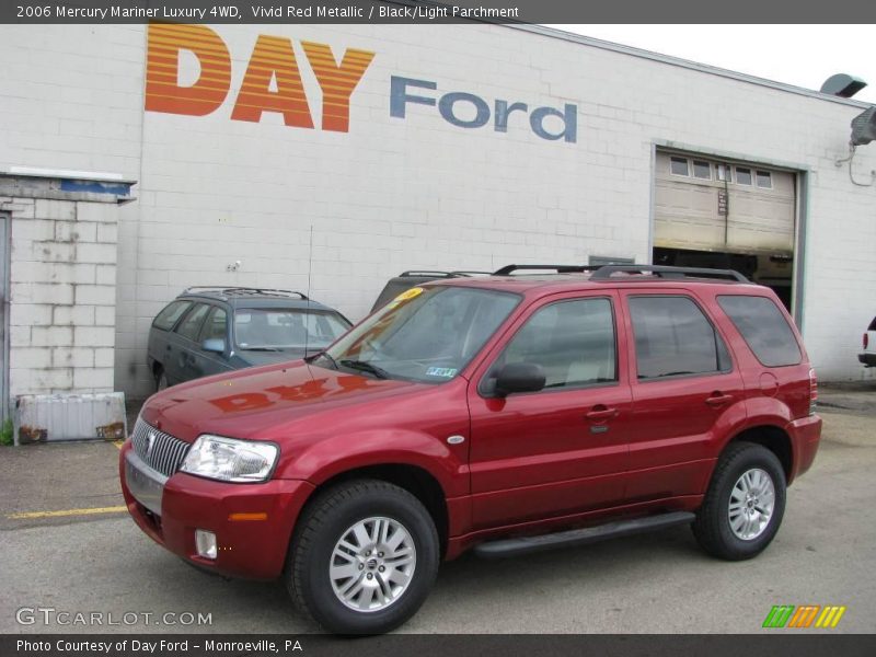Vivid Red Metallic / Black/Light Parchment 2006 Mercury Mariner Luxury 4WD