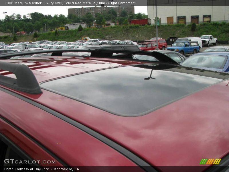 Vivid Red Metallic / Black/Light Parchment 2006 Mercury Mariner Luxury 4WD