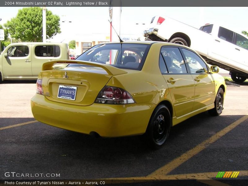 Lightning Yellow / Black 2004 Mitsubishi Lancer OZ Rally