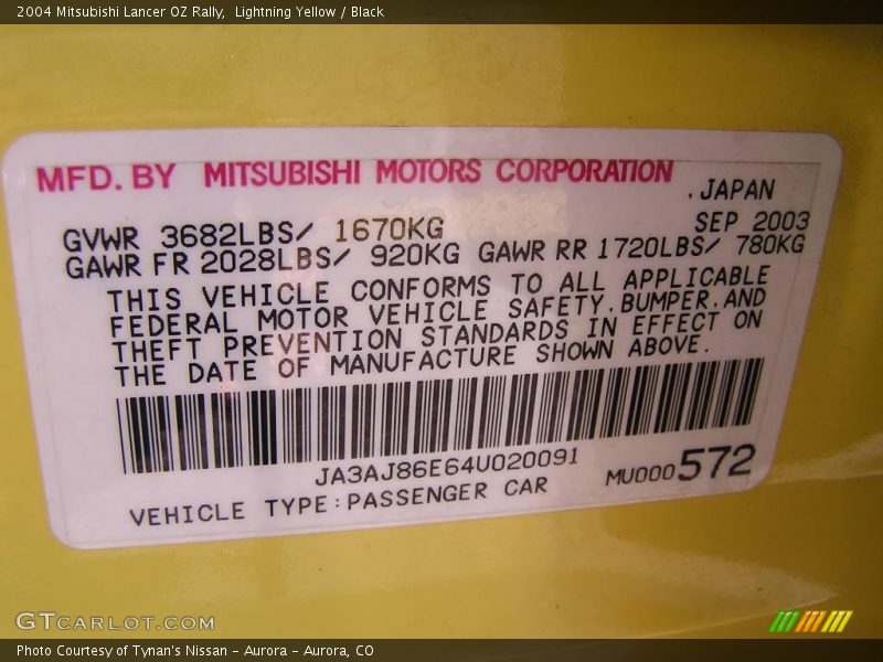Lightning Yellow / Black 2004 Mitsubishi Lancer OZ Rally