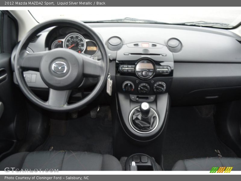 Dashboard of 2012 MAZDA2 Sport