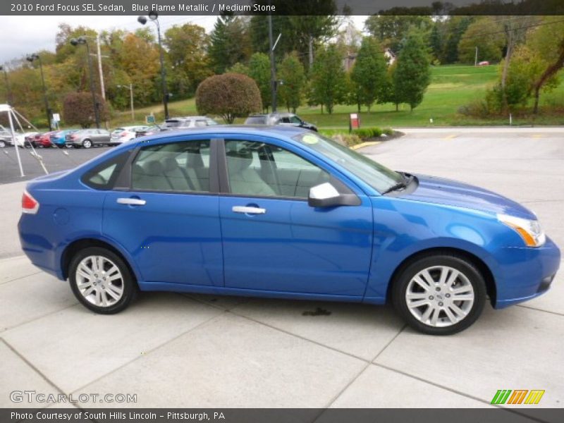 Blue Flame Metallic / Medium Stone 2010 Ford Focus SEL Sedan