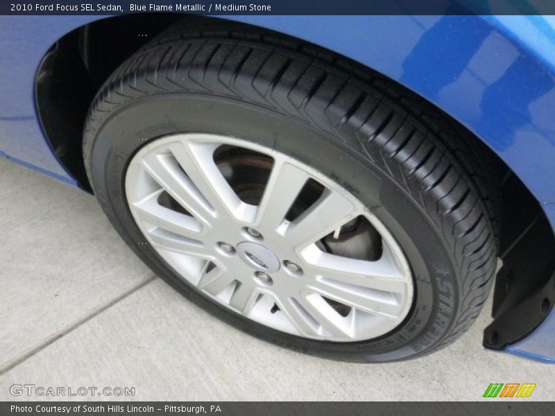 Blue Flame Metallic / Medium Stone 2010 Ford Focus SEL Sedan