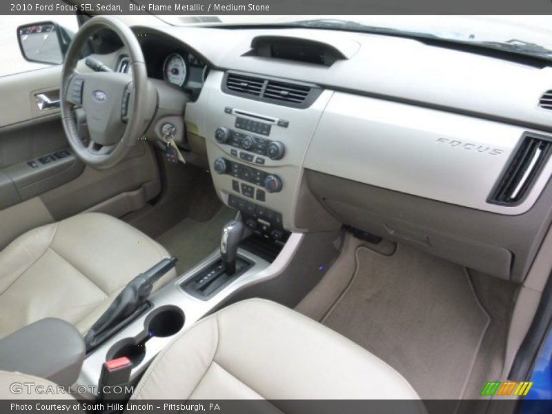 Blue Flame Metallic / Medium Stone 2010 Ford Focus SEL Sedan