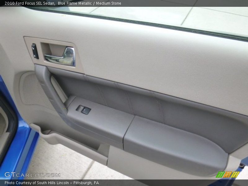 Blue Flame Metallic / Medium Stone 2010 Ford Focus SEL Sedan