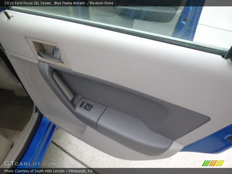 Blue Flame Metallic / Medium Stone 2010 Ford Focus SEL Sedan
