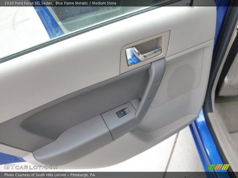 Blue Flame Metallic / Medium Stone 2010 Ford Focus SEL Sedan