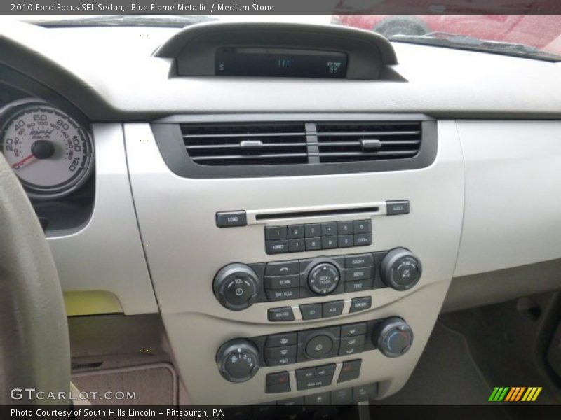 Blue Flame Metallic / Medium Stone 2010 Ford Focus SEL Sedan
