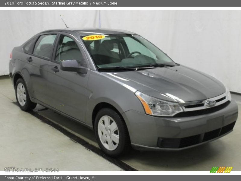 Sterling Grey Metallic / Medium Stone 2010 Ford Focus S Sedan