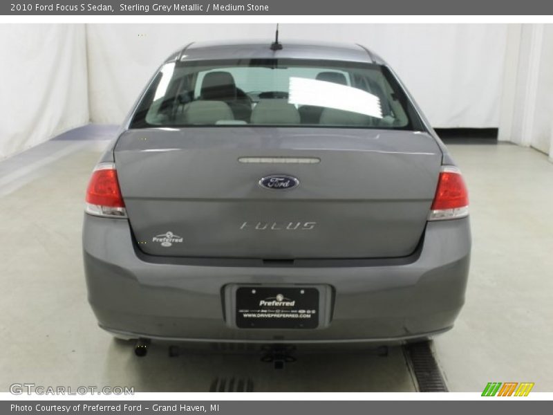 Sterling Grey Metallic / Medium Stone 2010 Ford Focus S Sedan