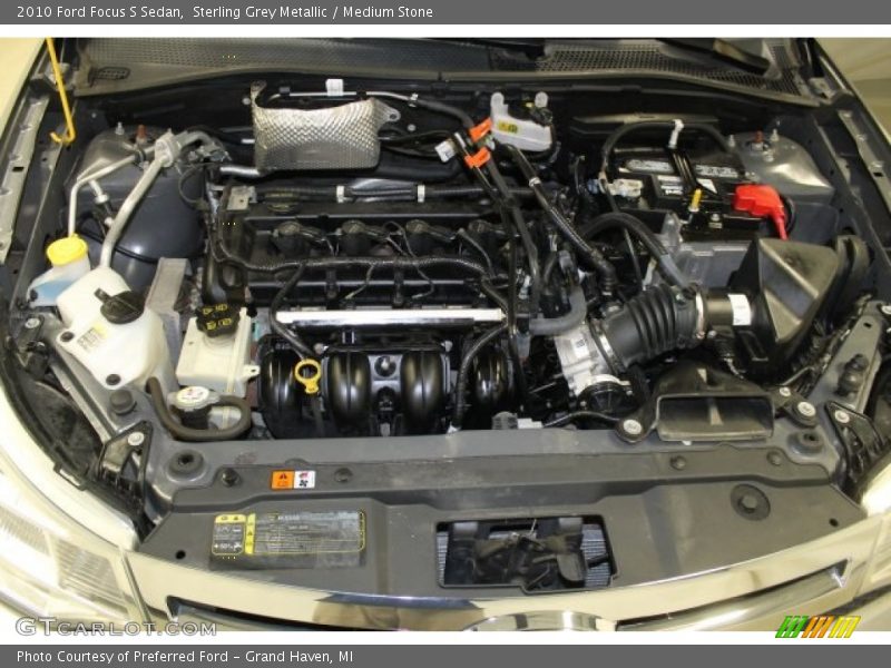 Sterling Grey Metallic / Medium Stone 2010 Ford Focus S Sedan